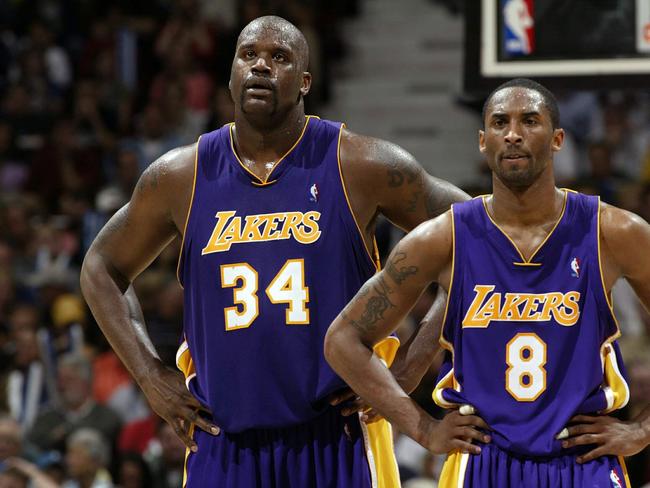 Shaquille O'Neal #34 and Kobe Bryant #8 of the Los Angeles Lakers stand on the court while playing against the Minnesota Timberwolves in Game Five of the Western Conference Finals during the 2004 NBA Playoffs on May 29, 2004 at Target Center in Minneapolis, Minnesota. Picture: Getty