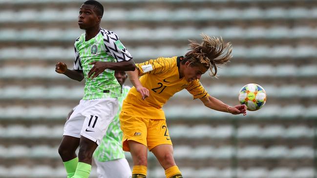 Cameron Peupion of Australia wins the ball in a battle with Nigeria’s Quadri Edun. Picture: FIFA/Getty Images