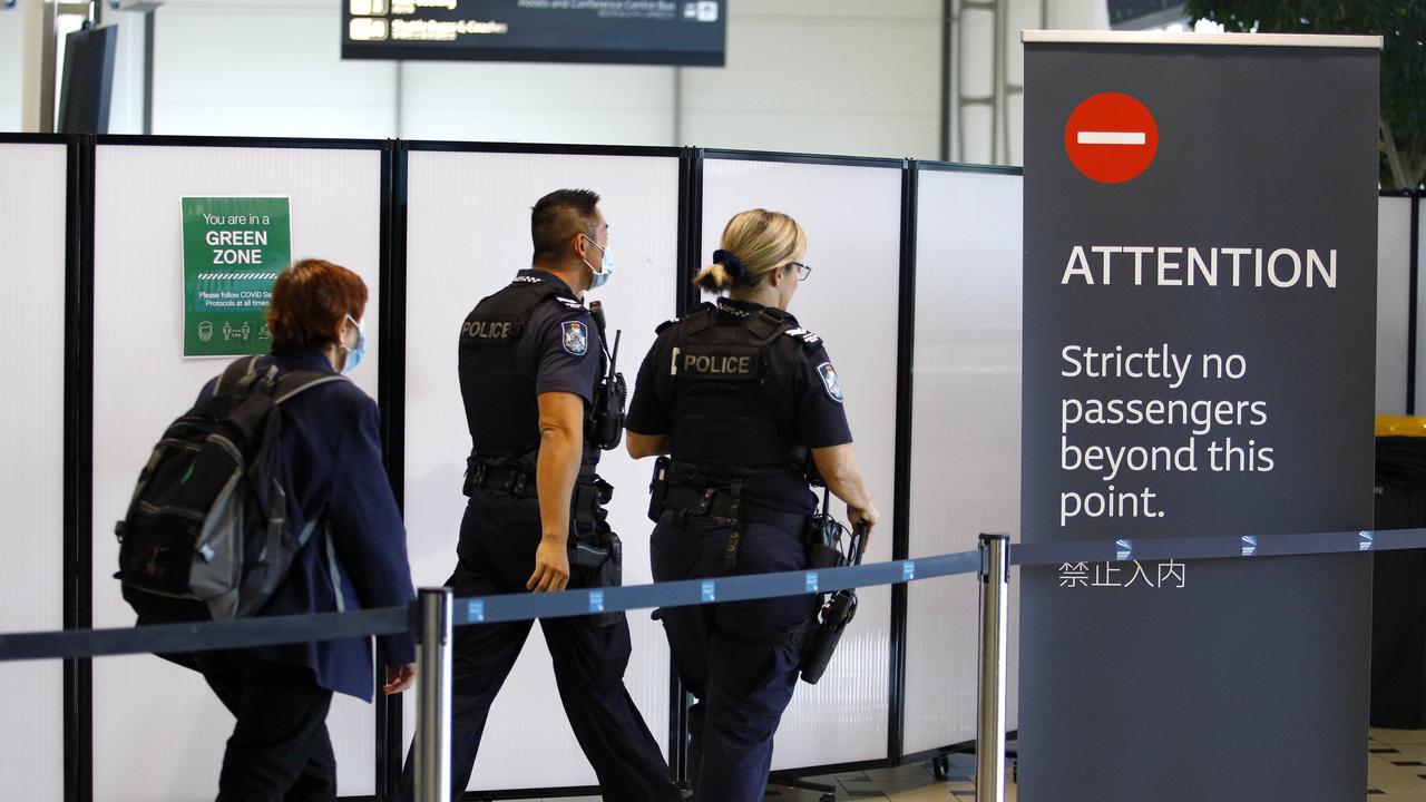 General views of signage showing red and green zones at the Brisbane Airport international terminal. Photo: Tertius Pickard.