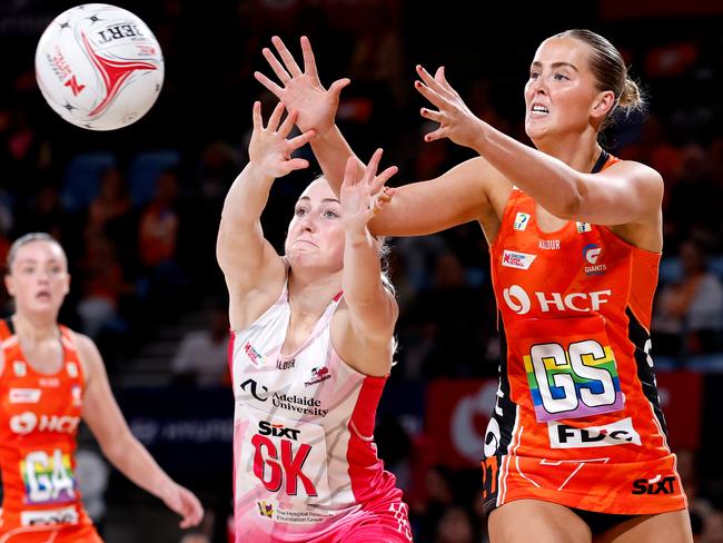 SYDNEY, AUSTRALIA - MAY 03: Matisse Letherbarrow of the Giants competes with Sanmarie Visser of the Thunderbirds during the round four Super Netball match between Giants Netball and Adelaide Thunderbirds at Ken Rosewall Arena, on May 03, 2025, in Sydney, Australia. (Photo by Brendon Thorne/Getty Images)