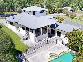 A four-bedroom house with pool on 2267sq m at 29 Pinewood St, Little Mountain, goers to auction Saturday at 3pm.