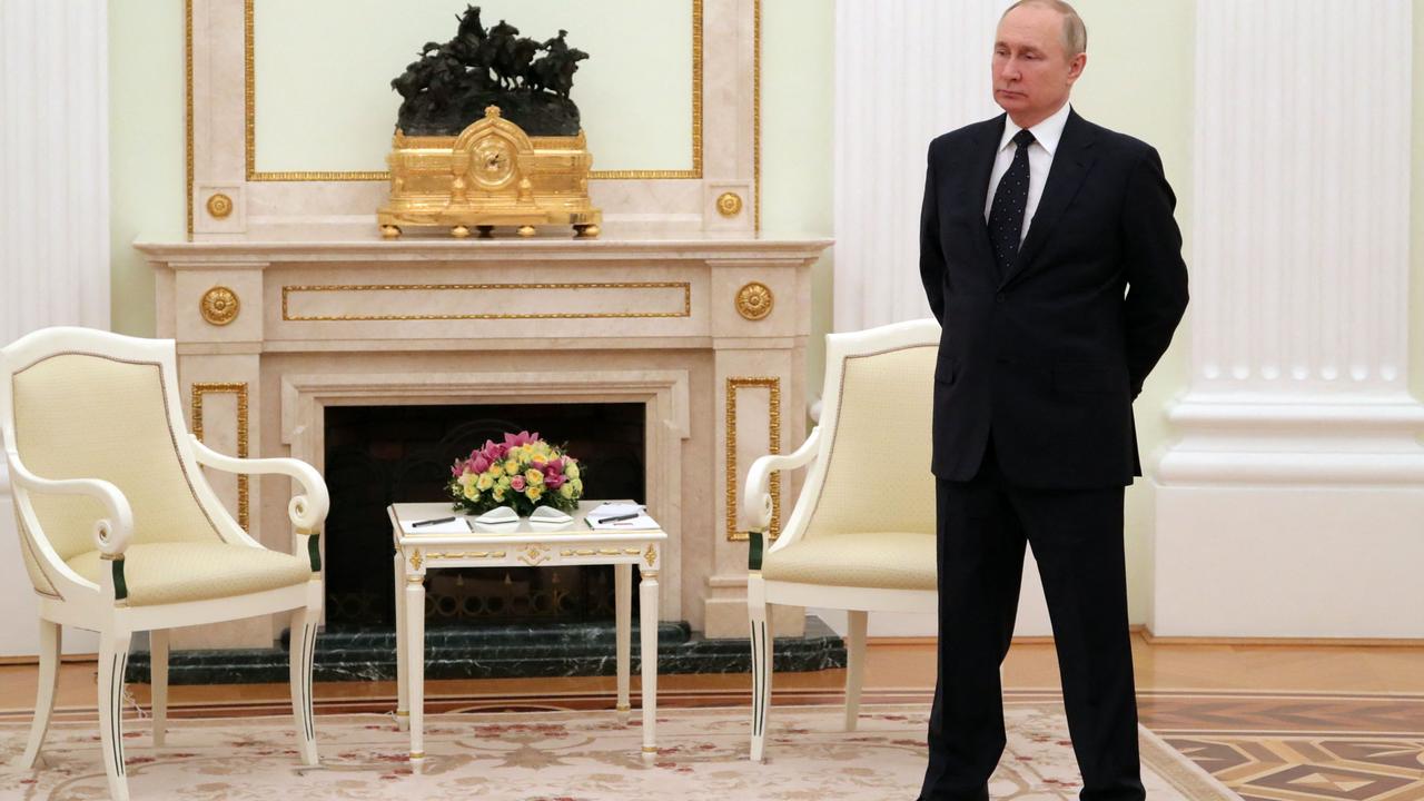 Russian President Vladimir Putin stands in a hall prior to a meeting with his Belarus' counterpart at the Kremlin in Moscow on March 11. Picture: Mikhail KLIMENTYEV / SPUTNIK / AFP