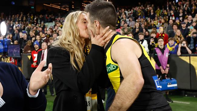 Trent Cotchin of the Tigers kisses wife Brooke before his 300th match. Photo by Michael Willson/AFL Photos via Getty Images.