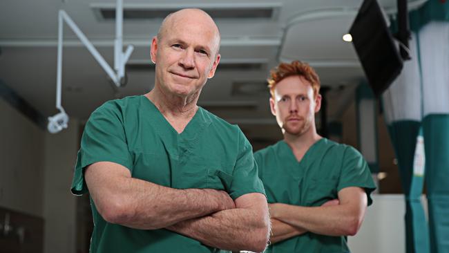 St Vincent’s Hospital emergency chief Paul Preisz and nurse Travis Brown have put their personal lives on hold to combat the pandemic. Picture: Adam Yip