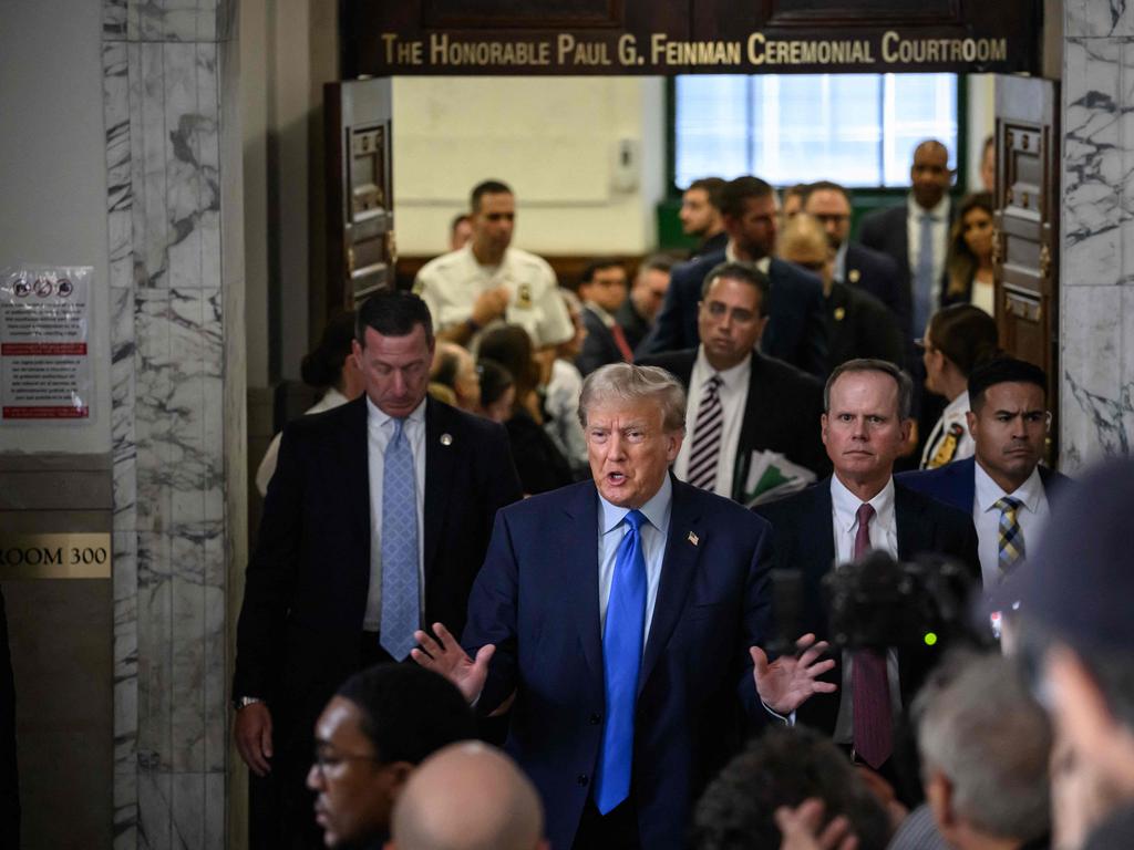 Donald Trump talks to members of the media outside the court room at the New York State Supreme Court on the first day of his civil fraud trial. Picture: AFP