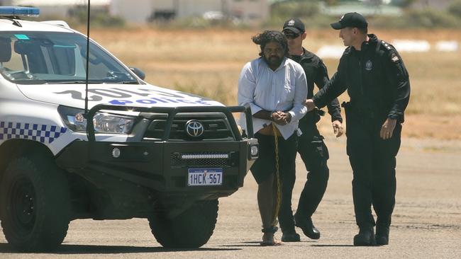 Terence Darrell Kelly boards a plane in Carnarvon. Picture: Getty