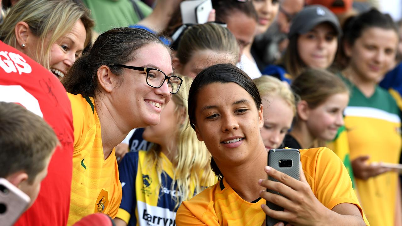 Sam Kerr gets a selfie with a fan in Geelong. Picture: AAP Image/Joe Castro.