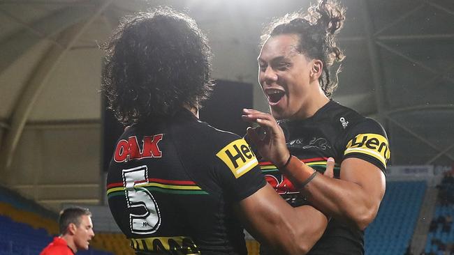 GOLD COAST, AUSTRALIA - SEPTEMBER 03: Brian To'o of the Panthers celebrates scoring a try with team mate Jarome Luai of the Panthers during the round 25 NRL match between the Parramatta Eels and the Penrith Panthers at Cbus Super Stadium, on September 03, 2021, in Gold Coast, Australia. (Photo by Chris Hyde/Getty Images)