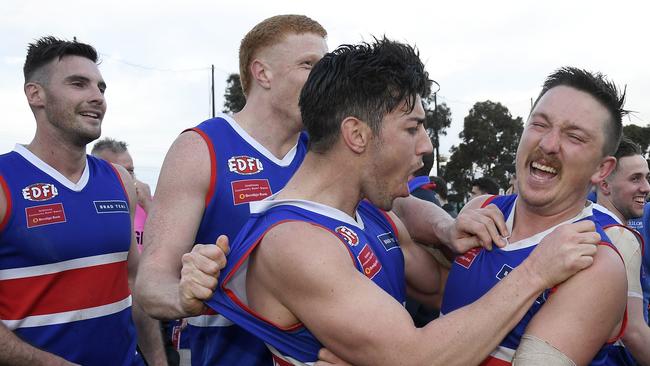 Keilor players celebrate after winning the 2019 premiership. Picture: Andy Brownbill