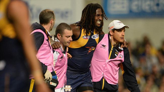 West Coast's Nic Naitanui injured his knee. Picture: Daniel Wilkins