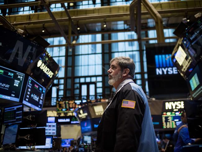 NEW YORK, NY - JUNE 18: Traders work the floor of the New York Stock Exchange during the IPO debut of the company Fitbit on June 18, 2015 in New York City. Fitbit Inc. opened 52% above their IPO price during its market debut. Eric Thayer/Getty Images/AFP == FOR NEWSPAPERS, INTERNET, TELCOS & TELEVISION USE ONLY ==