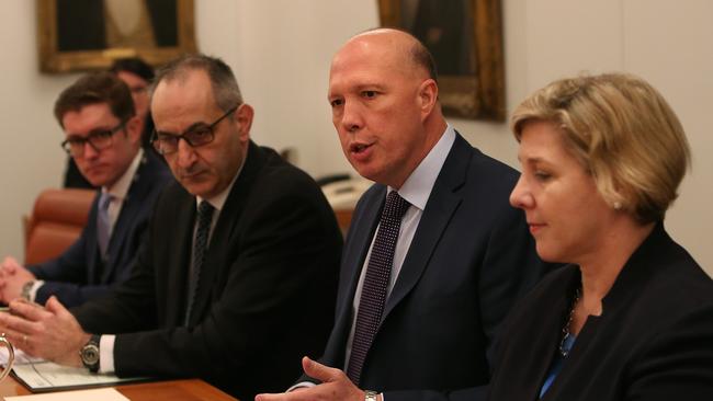 Minister for Home Affairs Peter Dutton (second from right) said the responsible Westpac executives would pay a “serious price” for their actions. Picture: Kym Smyth