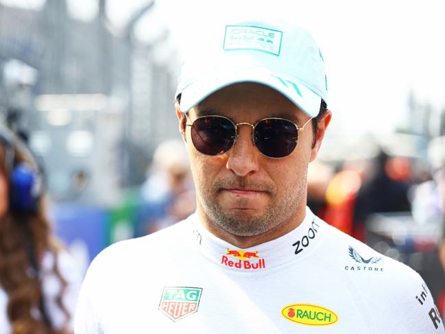 MEXICO CITY, MEXICO - OCTOBER 27: Sergio Perez of Mexico and Oracle Red Bull Racing looks on, on the grid prior to the F1 Grand Prix of Mexico at Autodromo Hermanos Rodriguez on October 27, 2024 in Mexico City, Mexico. (Photo by Mark Thompson/Getty Images)