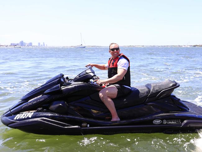 Premier Steven Miles arrives on Jet Ski to Southport on the last day of the Queensland Election campaigning ahead of Saturdays Election Day. Pics Adam Head