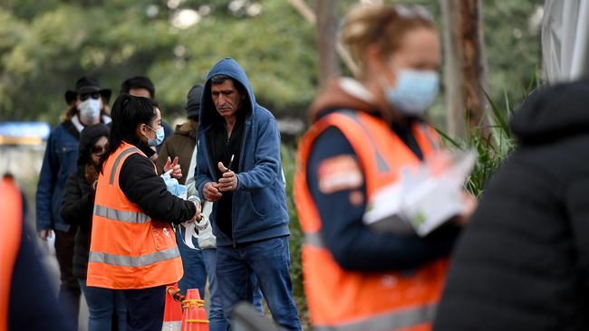 People line up to receive their COVID-19 vaccination at the NSW Health Vaccination hub in Sydney. Picture: NCA NewsWire/Bianca De Marchi