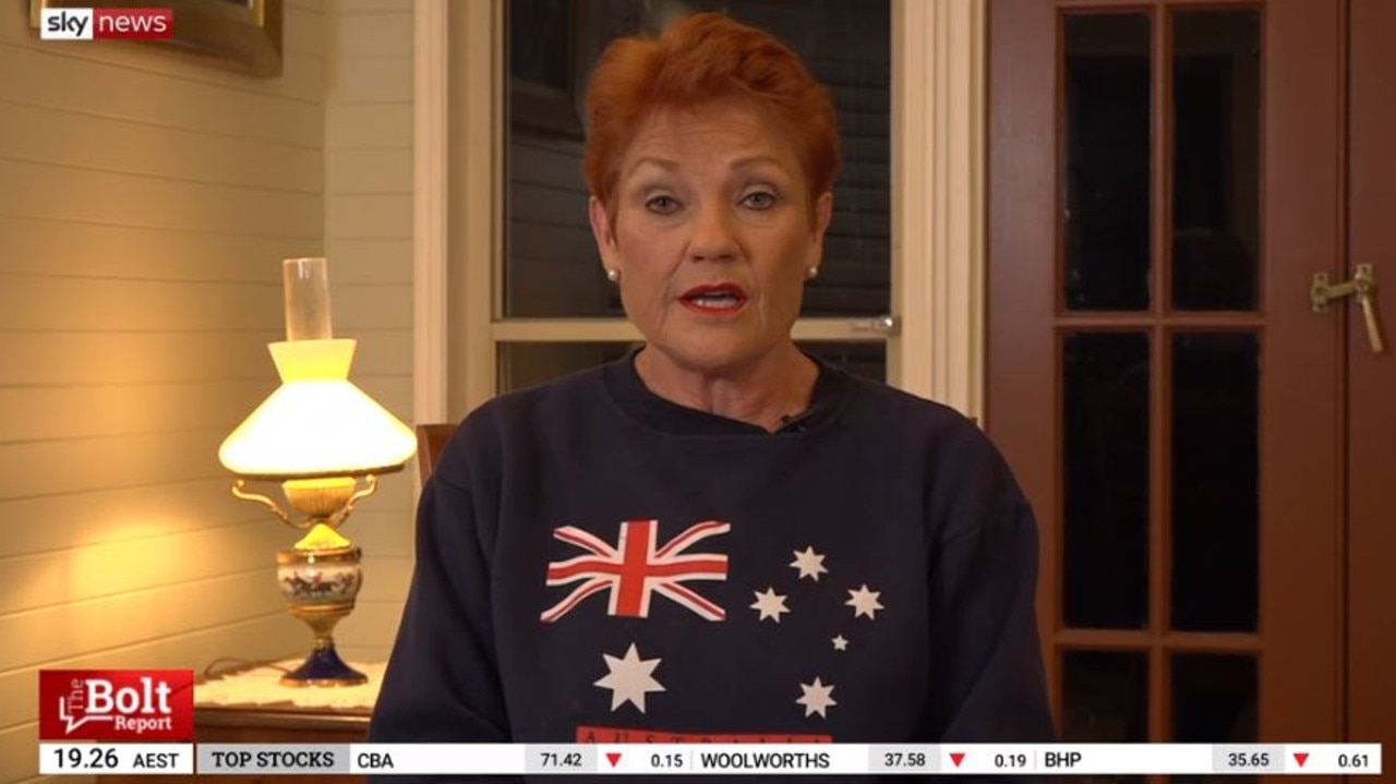 A defiant Pauline Hanson wearing an Australian flag shirt told Andrew Bolt she ‘didn’t care’ about the TV ban. Picture: Sky News