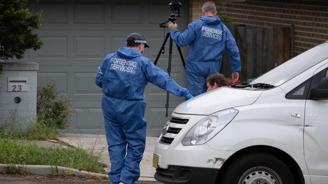 Forensic officers at the scene. Picture: Monique Harmer