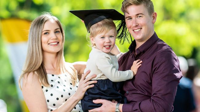 Husband and wife celebrate graduation success together