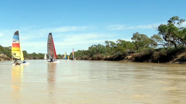 Lake Eyre Yacht Club hosts a regatta on the Warburton River. Picture: Bob Backway