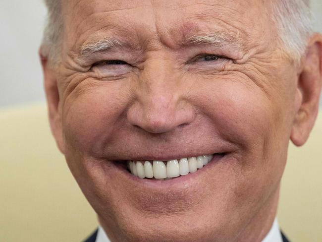 US President Joe Biden smiles during a meeting with Indian Prime Minister Narendra Modi in the Oval Office of the White House on September 24, 2021, in Washington, DC. (Photo by Jim WATSON / AFP)