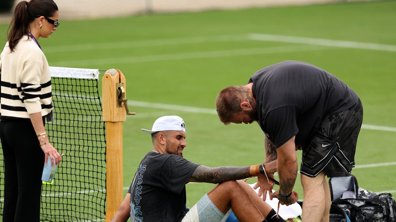 Nick Kyrgios has his wrist strapped during Wimbledon’s 2023 tournament. (Photo by Clive Brunskill/Getty Images)