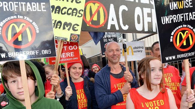 Protesters gather outside the McDonald’s in Tecoma on its first day of operation. Picture: Nicole Garmston. 