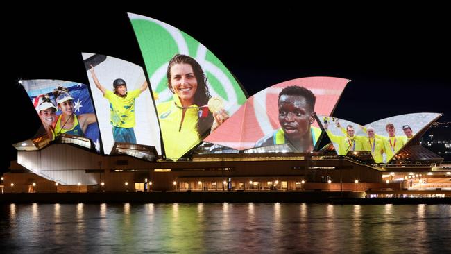 Mariafe Artacho del Solar, Taliqua Clancy, Keegan Palmer, Jessica Fox, Peter Bol, Alexander Purnell, Spencer Turrin, Jack Hargreaves and Alexander Hill projected on the sails of the Sydney Opera House in tribute to their Olympic performances.