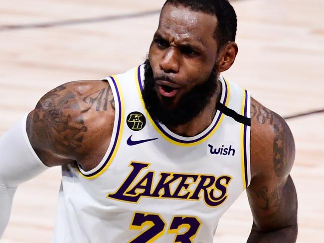 LAKE BUENA VISTA, FLORIDA - OCTOBER 11: LeBron James #23 of the Los Angeles Lakers reacts during the fourth quarter against the Miami Heat in Game Six of the 2020 NBA Finals at AdventHealth Arena at the ESPN Wide World Of Sports Complex on October 11, 2020 in Lake Buena Vista, Florida. NOTE TO USER: User expressly acknowledges and agrees that, by downloading and or using this photograph, User is consenting to the terms and conditions of the Getty Images License Agreement.  (Photo by Douglas P. DeFelice/Getty Images)