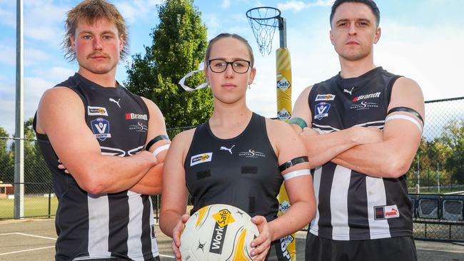 Darcy Coon, Tia Stinchcombe and Alex Riches from the Clunes Magpies Football Netball Club wearing black and white armbands. Black in memory of Hannah McGuire, white in honour of White Ribbon Foundation Picture: Brendan Beckett