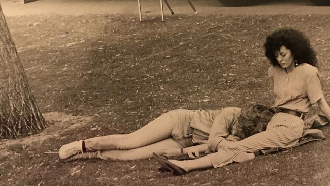 Backstage at an Adelaide F1 Grand Prix event a photographer side of stage snapped this image Jim and I relaxing on the grass. Picure: Sue Hedley