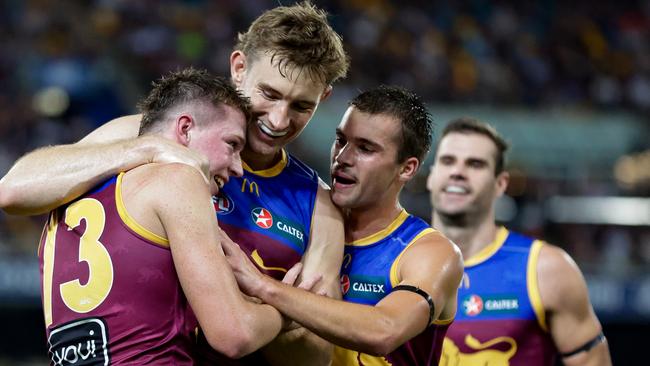 BRISBANE, AUSTRALIA - MAY 05: Logan Morris of the Lions celebrates a goal during the 2024 AFL Round 08 match between the Brisbane Lions and the Gold Coast SUNS at The Gabba on May 05, 2024 in Brisbane, Australia. (Photo by Russell Freeman/AFL Photos via Getty Images)