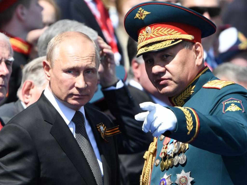 Vladimir Putin and Russian Defence Minister Sergei Shoigu during the Victory Day military parade on June 24, 2020 in Moscow, Russia. Picture: Host Photo Agency via Getty Images.