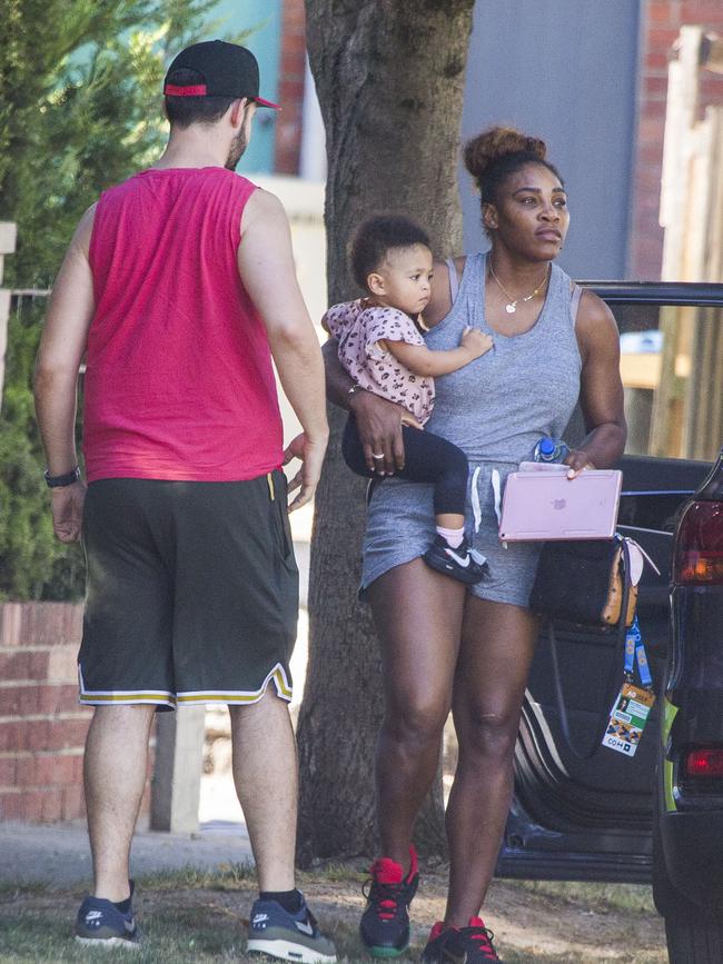 Serena Williams and her husband Alexis Ohanian enjoy an afternoon walk with their 1-year-old daughter Alexia Olympia. Serena's daughter looked seriously cute, toddling her way down the footpath, wearing Nike sneakers like her Mummy. Picture: MediaMode