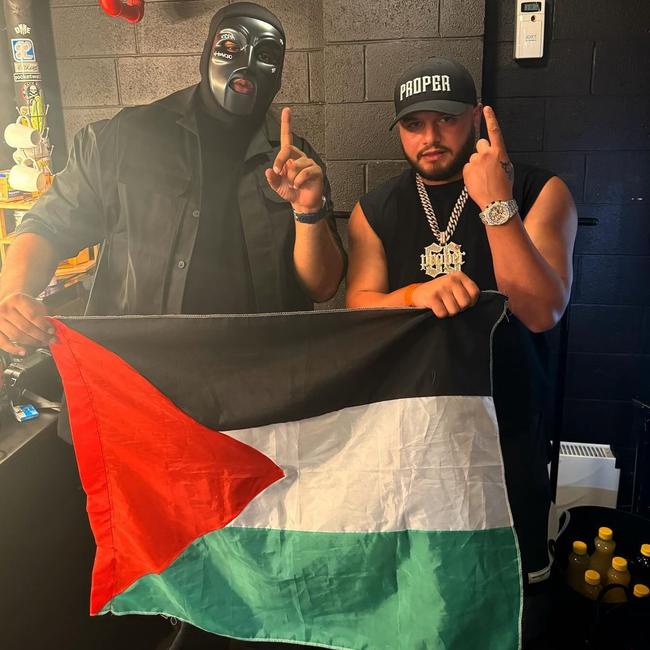 British rapper M Huncho and Ali 'Ay Huncho' Younes holding a Palestinian flag during a concert at the Metro Theatre on December 15. Photo: Instagram