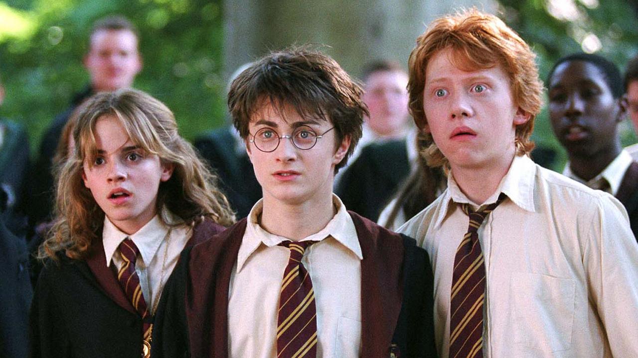 Emma Watson as Hermione Granger, Daniel Radcliffe as Harry Potter and Rupert Grint as Ron Weasley in the original films.