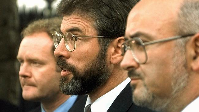 Sinn Fein leaders L-R Martin McGuinness, Gerry Adams and Caoimhglin O’Caolain meet reporters outside the White House in 1997.