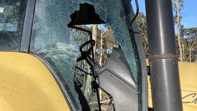 A smashed window on Mark Hutchings' vandalised tractor