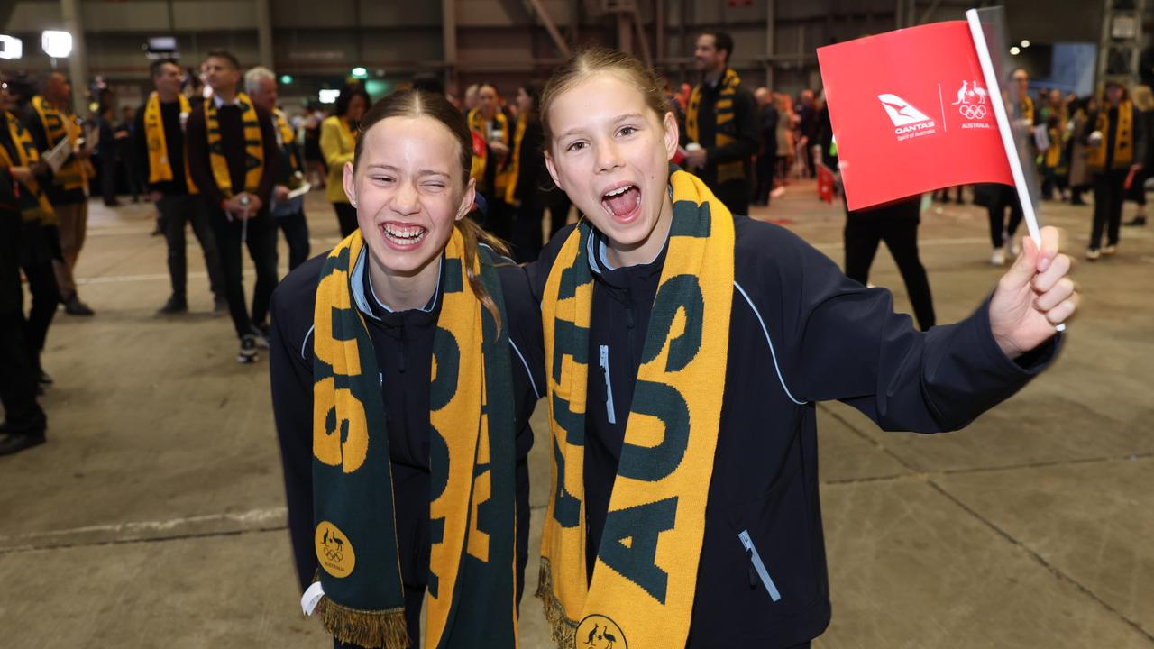 Olivia Rippon and twin sister Zoe Nippon waiting for her aunty and Stingers Coach Bec Rippon to arrive home. Picture: Rohan Kelly