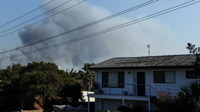 The battle against the out-of-control bushfire at Peregian Beach continues today. Picture: Lachie Millard