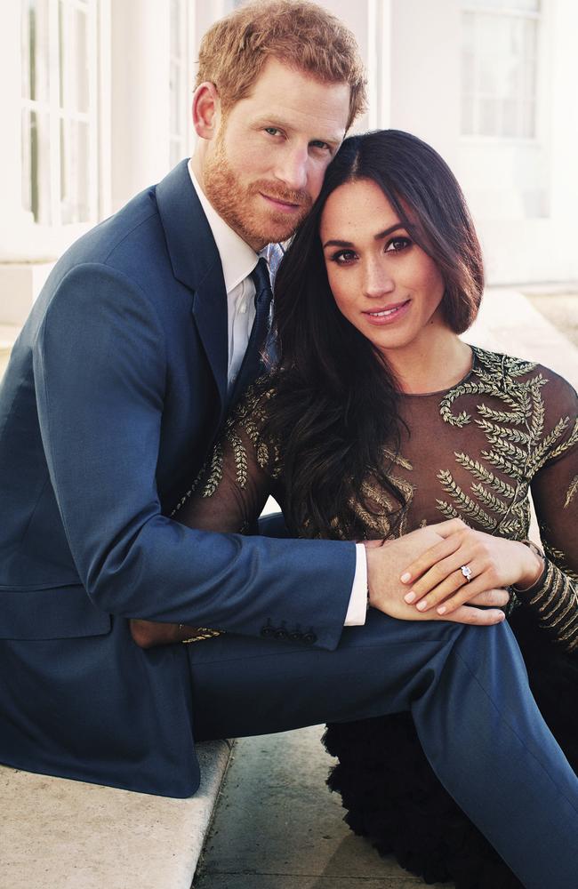 Meghan wore a Ralph and Russo gown pose for an engagement photo with Prince Harry in Windsor. Picture: Alexi Lubomirski via AP