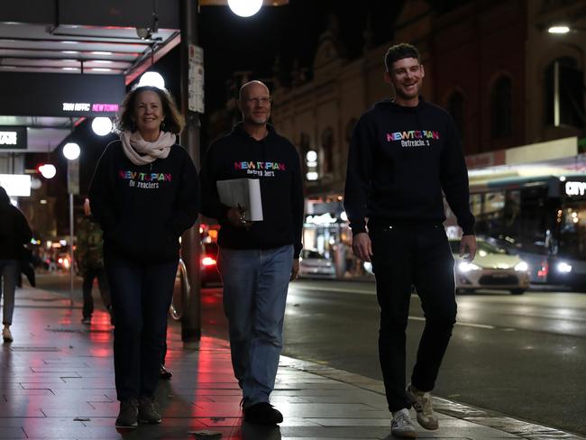 Newtopian volunteers Sue Byrne, Jim Lowe and Lee Coleman, on an outreach walk on King St Newtown. On the night the Sunday Telegraph joined them, they spoke to five people doing it tough in the space of a single block. Picture: Jonathan Ng