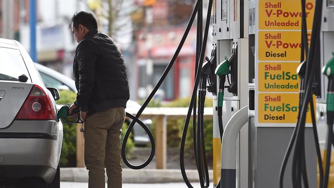 Petrol prices are expected to keep dropping this month. Photo: Paul Ellis