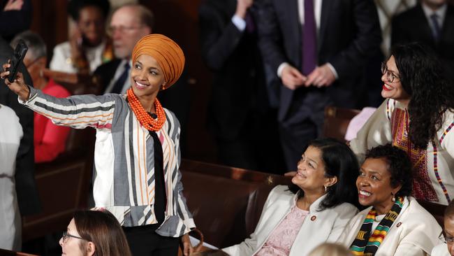 Ilhan Oma takes a selfie with Rashida Tlaib and Pramila Jayapal. Picture: AP.