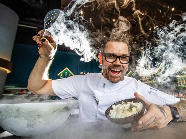 ** WEEKEND PAPERS ** Chef Zac Sykes with the liquid nitrogen tres leche dessert at Azteca restaurant.Picture: Nigel Hallett