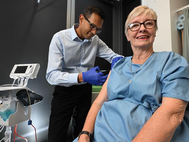 Principal Investigator Dr Nischal Sahai and participant Carolyn Rose, during a University of Southern QLD clinical trial of an investigative 3-in-1 vaccine of mRNA vaccine for COVID-19, Flu and RSV, in South Brisbane. Picture: Lyndon Mechielsen/Courier Mail