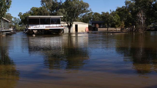 ADELAIDE, AUSTRALIA - Advertiser Photos FEBRUARY 8, 2023: The aftermath and debris left behind as the Murray River Flood waters recede at Foxtale Houseboats house and property in the Riverland town of Morgan SA. Picture Emma Brasier