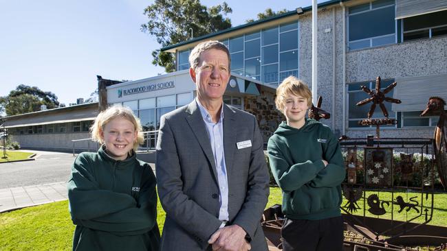 Blackwood High School principal Chris Brandwood – with Year 7 students Paige, 13, and Callum, 12 – took on the role at the start of 2023. Picture: Mark Brake