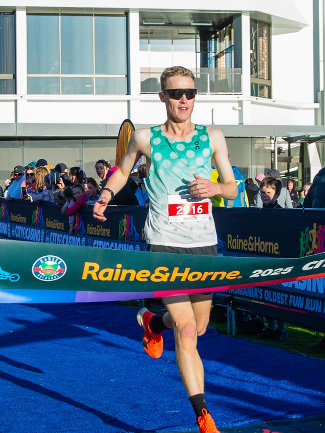 Thomas Wilson crosses the finish line in first place for the 7km race at the City to Casino on Sunday 18th May 2025. Picture: Linda Higginson
