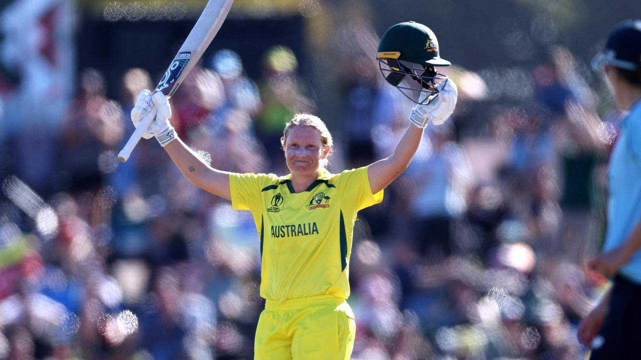 Australia's Alyssa Healy celebrates reaching her century during the 2022 Women's Cricket World Cup final match against England at the Hagley Oval. Photo: AFP