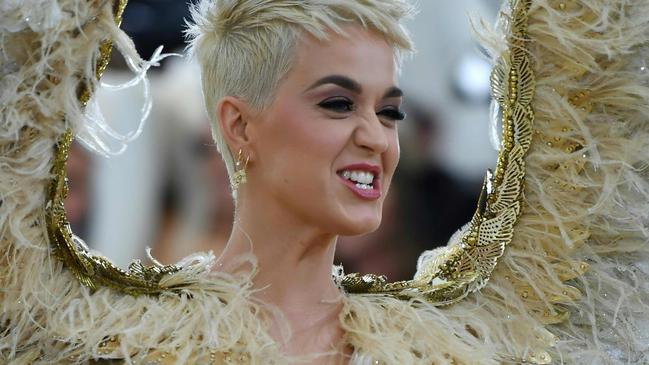 Katy Perry arrives for the 2018 Met Gala on May 7, 2018, at the Metropolitan Museum of Art in New York. The Gala raises money for the Metropolitan Museum of Art’s Costume Institute. The Gala's 2018 theme is “Heavenly Bodies: Fashion and the Catholic Imagination.” / AFP PHOTO / Angela WEISS